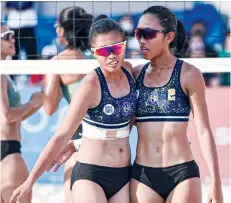  ?? (UAAP photo) ?? Negrense Honey Grace Cordero and Kly Orillaneda of National University Lady Bulldogs hope to pull off a massive upset against the University of Santo Tomas Golden Tigresses in the UAAP Season 85 women's beach volleyball finals.
