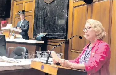  ?? TOM DAVIES/AP ?? Julia Vaughn, executive director of Common Cause Indiana, speaks during a redistrict­ing hearing Aug. 11 as Republican Rep. Tim Wesco, chairman of the Indiana House Elections Committee, listens at the Indiana Statehouse in Indianapol­is.