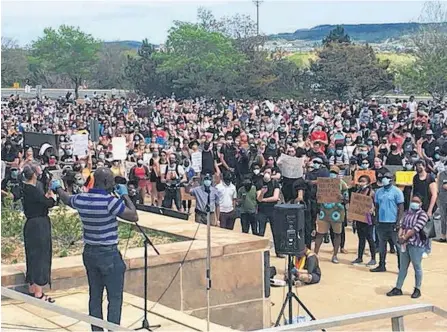  ?? TELEGRAM FILE PHOTO ?? Dr. Paul Banahene Adjei, a Memorial University professor — pictured here speaking to the thousands of people who turned out at Confederat­ion Building in St. John’s for the Black Lives Matter NL rally in June 2020 — said there needs to be a collective effort to help solve the problem of racism in our society.