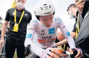  ?? AFP ?? Slovenian rider Tadej Pogacar rests after winning the 20th stage.