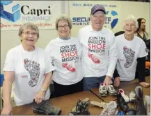  ??  ?? From left are Bea Carignan, Bev Lauder, Don Lauder and Betty Vogl, all volunteers with the shoe bank.