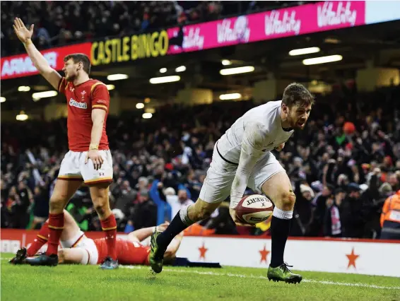  ?? PICTURE: Getty Images ?? Acres of space: Elliot Daly receives the perfect pass from Owen Farrell to skin Alex Cuthbert