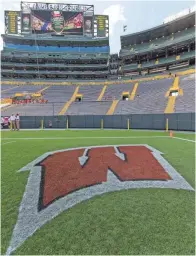  ?? JEFF HANISCH-USA TODAY SPORTS ?? Previously unranked Wisconsin defeated fifth-ranked LSU, 16-14, at Lambeau Field on Sept. 3.