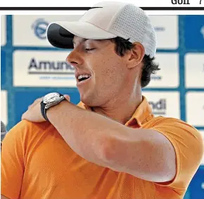  ?? GETTY IMAGES ?? Feeling the buzz: McIlroy swats away an insect in Versailles