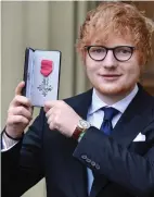  ??  ?? Proud: Ed Sheeran with his MBE