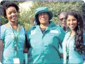  ??  ?? The Director-General of Environmen­tal Affairs Nosipho Ngcaba assisting youth in clean-up activities at last year’s event.