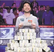  ?? John Locher / Associated Press ?? John Cynn smiles after winning the World Series of Poker main event on Sunday in Las Vegas.