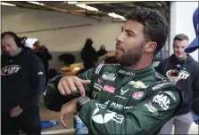  ?? JOHN RAOUX — THE ASSOCIATED PRESS ?? Bubba Wallace motions to his crew during practice for the Daytona 500 on Feb. 14.