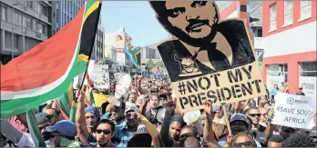  ??  ?? UNITED IN ANGER: Protesters of diverse races, religions and ages from across South Africa marching against President Jacob Zuma in protest over the axing of former finance minister Pravin Gordhan.