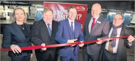  ??  ?? Launch Mr Mackay cuts the tape in 2015 to launch the service watched by (left) councillor­s Johanna Boyd and Craig Martin, Virgin Trains’Warrick Dent and John McNally, MP for Falkirk