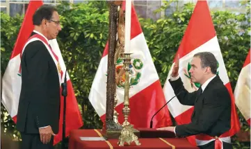  ??  ?? Vizcarra and Del Solar attend a swearing-in ceremony at the government palace in Lima. — Reuters photo