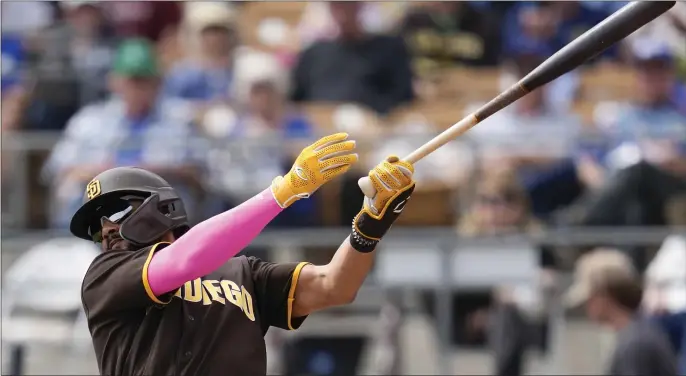  ?? ASHLEY LANDIS — THE ASSOCIATED PRESS ?? San Diego Padres’ Fernando Tatis Jr. (23) pops out to second base during the first inning of a spring training baseball game against the Los Angeles Dodgers in Glendale, Calif., Monday, March 6, 2023.