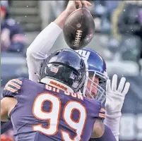  ?? AP ?? MIKE DROP: Mike Glennon gets drilled by the Bears’ Trevis Gipson during Sunday’s ugly loss.