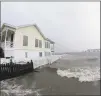  ?? Tom Copeland / Associated Press ?? High winds and water surround a house as Hurricane Florence hits Swansboro N.C., on Friday. The remnants of the storm may affect Connecticu­t early next week.