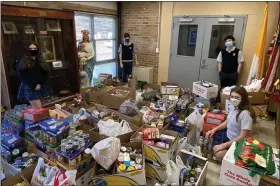  ?? PHOTO SUBMITTED BY SHERRI MULDOON ?? Holy Rosary Regional Catholic School in Plymouth Meeting recently held its annual food drive for the Patrician Society.