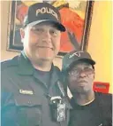  ??  ?? Fequiere Pierre, right, was reunited with Pembroke Pines Police Officer Luis Bermudez at LongHorn Steakhouse on Friday.