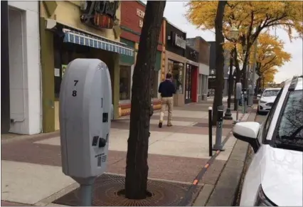  ?? MEDIANEWS GROUP FILE PHOTO ?? These new smart parking meters were tested in Royal Oak last fall along one block on the east side of Main Street between Third and Fourth streets. City Manager Paul Branke said parking revenue has decreased due to the COVID-19pandemic.