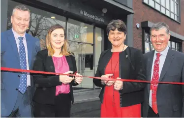  ??  ?? Cathal Geoghegan and Trevor Annon of Mount Charles with Sinn Fein MLA Megan Fearon and DUP leader Arlene Foster at the offical opening of the firm’s offices on Belfast’s Ormeau Road