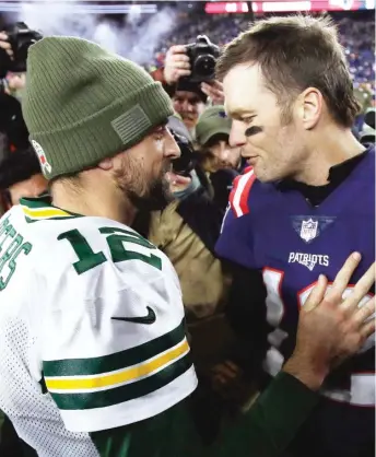  ?? AP ?? The last time Aaron Rodgers (left) and Tom Brady squared off came in 2018, when Brady was with the Pats.