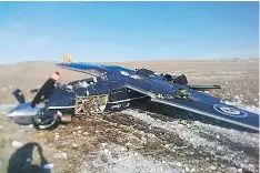  ?? THE CANADIAN PRESS/HO - ROYAL CANADIAN AIR FORCE ?? A CT-156 Harvard II training plane crashed south of CFB Moose Jaw in January. The initial report indicates the instructor and student pilot had to eject.