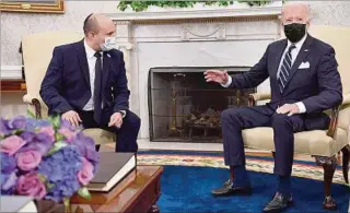  ??  ?? CASA BLANCA.
El presidente Joe Biden recibió ayer al primer ministro de Israel, Naftali Bennett.