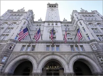  ?? JULIO CORTEZ — THE ASSOCIATED PRESS ?? Former President Donald Trump's businesses and inaugural committee have reached a deal to pay Washington, D.C., $750,000to resolve a lawsuit that alleged the committee overpaid for events at the Trump Internatio­nal Hotel, above.