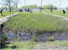  ?? KRIS DUBE TORSTAR ?? People attend a heritage designatio­n ceremony in Welland Saturday to recognize the significan­ce of the canal feeder lock near Ontario Road and Prince Charles Drive.