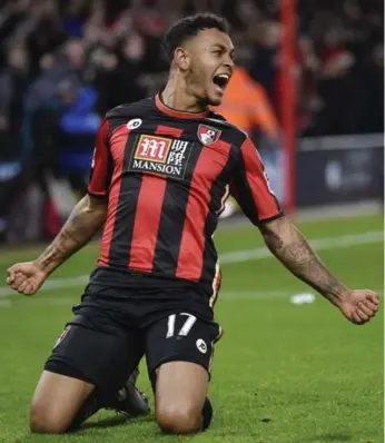  ?? TOBY MELVILLE/REUTERS ?? Bournemout­h’s Joshua King celebrates scoring his team’s second goal in Saturday’s upset 2-1 victory over Man U.