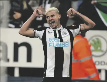  ?? OWEN HUMPHREYS/PA VIA AP ?? Newcastle United’s Bruno Guimaraes celebrates scoring during the English Premier League soccer match at St. James’ Park, Newcastle upon Tyne, England, on Monday.