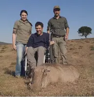  ??  ?? Piet with his second warthog flanked by Truzanne and Hein.