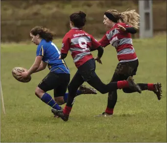  ?? Photo: Noel McMullen. ?? Rathdrum’s Heather Cullen crosses the line for a try against Mullingar.