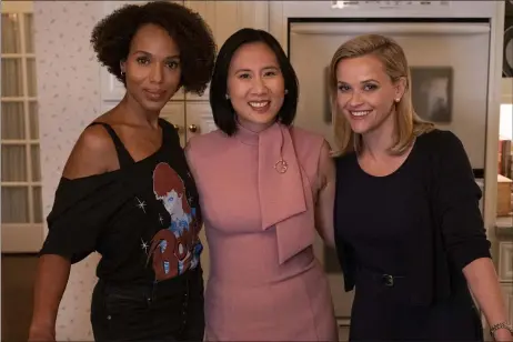  ?? HULU ?? “Little Fires Everywhere” author Celeste Ng, center, poses with actresses Kerry Washington, left, and Reese Witherspoo­n, stars of Hulu’s new adaptation of the novel.