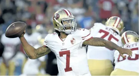  ?? DENIS POROY/THE ASSOCIATED PRESS ?? In this Sept. 1, 2016, file photo, San Francisco 49ers quarterbac­k Colin Kaepernick passes against the San Diego Chargers during the first half of an NFL preseason football game, in San Diego.