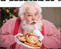  ??  ?? Sweet treat: Even Santa’s a fan of cinnamon buns