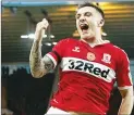  ??  ?? DOUBLE UP: Hugill celebrates scoring his second