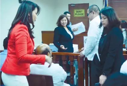  ?? SUNSTAR FOTO / AMPER CAMPAÑA ?? LEGAL BATTLE. Lawyers of SM Prime Holdings Inc. led by Chrysilla Carissa Bautista (center) presented their witnesses during yesterday’s court hearing.