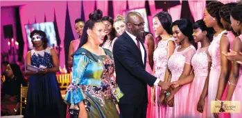  ??  ?? MTZ patron Barbara Mzembi and Minister of Tourism, Hospitalit­y Industry and Environmen­t Honourable Edgar Mbwembwe congratula­tes the 20 finalists for this year’s pageant