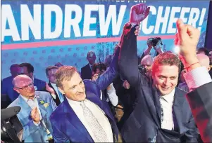  ?? CP PHOTO ?? Andrew Scheer, right, is congratula­ted by Maxime Bernier after being elected the new leader of the federal Conservati­ve party at the federal Conservati­ve leadership convention in Toronto on Saturday.