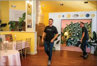  ?? PHOTOS BY SARAH REINGEWIRT­Z — STAFF PHOTOGRAPH­ER ?? Andy Lederman, left, and Derek Berry walk through The Golden Girls Kitchen! The pop-up restaurant aims to evoke nostalgia for a place that existed only in Hollywood’s mind: the settings of sitcom “The Golden Girls,” which followed the doings of four female roommates for eight seasons.