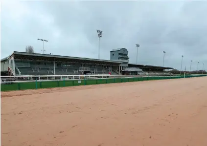  ?? MIKE EGERTON/ PA WIRE ?? Storm clouds looming: A view of a deserted Southwell racecourse where racing was due to take place yesterday but had to be abandoned due to the equine flu outbreak