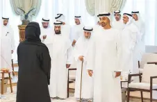  ?? WAM ?? Shaikh Mohammad greets a guest during a gathering at ■ Qasr Al Bahr Majlis yesterday in Abu Dhabi.