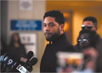  ?? AP FILE PHOTO ?? Actor Jussie Smollett talks to the media before leaving Cook County Court after his charges were dropped, in Chicago on March 26.