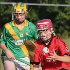  ??  ?? Conor Blake (Oulart-The Ballagh) gets way from Sebastian Veale.