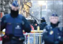  ?? PICTURE: AP ?? A police convoy carrying Salah Abdeslam and other members of the trial arrives under police guard at the Brussels Justice Palace.