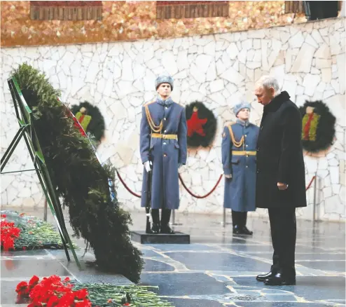  ?? SPUTNIK / POOL VIA REUTERS ?? Russian President Vladimir Putin attends a wreath-laying ceremony at the Mamayev Kurgan memorial complex in Volgograd on Thursday during an event to mark the 80th anniversar­y of the Second World War Battle of Stalingrad.