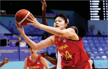  ?? PHOTOS BY XINHUA ?? Li Yueru’s dominating performanc­es for Team China at both ends of the court have seen her rise to prominence in recent years. Now the 23-year-old from Shanxi province — nicknamed “Baby Shaq”, in reference to NBA legend Shaquille O’Neal — hopes to take her game to the next level in the WNBA with the Chicago Sky.