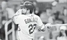  ?? ASSOCIATED PRESS FILE PHOTO ?? New York Mets’ Adrian Gonzalez drives in a run with a double during a National League baseball game against the Atlanta Braves on May 30.