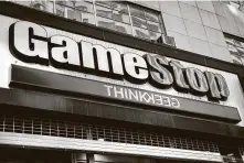  ?? John Minchillo / Associated Press ?? Many investors fully understand the contradict­ion between GameStop’s stock price and its business fundamenta­ls.