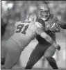  ?? AP/MARK J. TERRILL ?? Stanford defensive end Henry Anderson (91) takes down UCLA quarterbac­k Brett Hundley during the Cardinal’s 31-10 victory Friday.