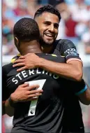  ??  ?? PROVIDER: Mahrez celebrates with City’s hat-trick hero Sterling